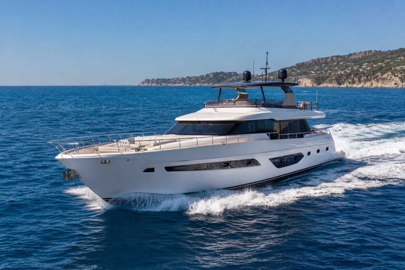 Yacht under way along the Côte d’Azur on a week-long cruise
